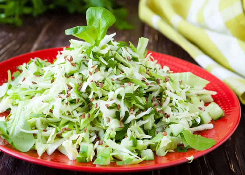 Salad with young cabbage with cucumbers and greens recipe